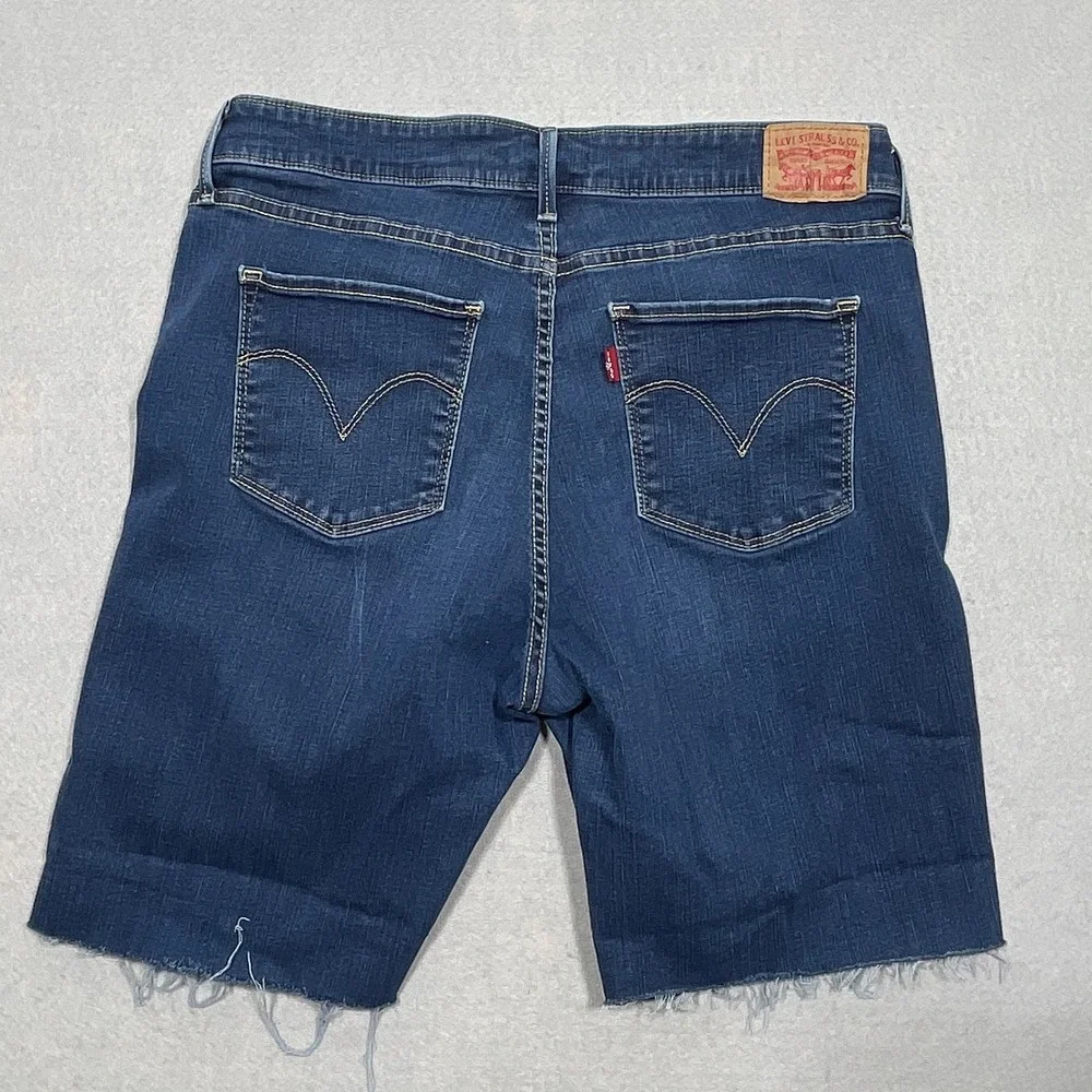 Levis Classic Mid Rise Cut Off‎ Shorts Women 16 Raw Hem Dark Blue Denim Casual